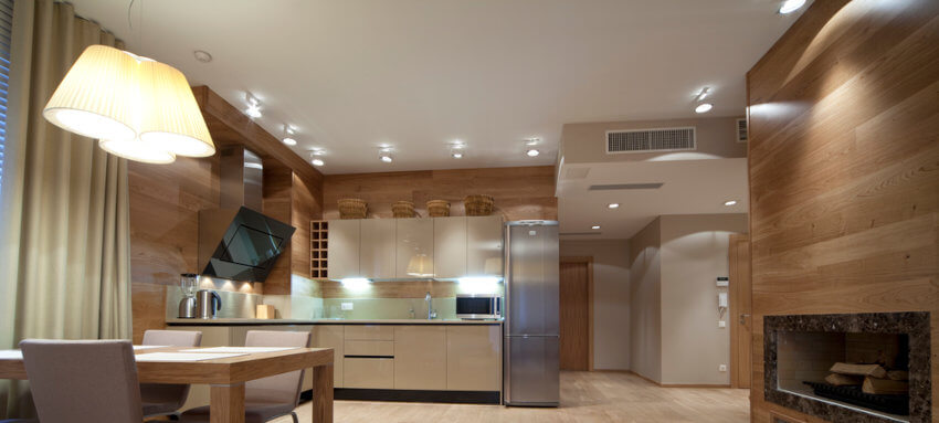 downlights in an open plan lounge and kitchen